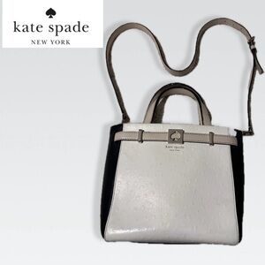 Kate spade 100% pebble leather, black white purse.